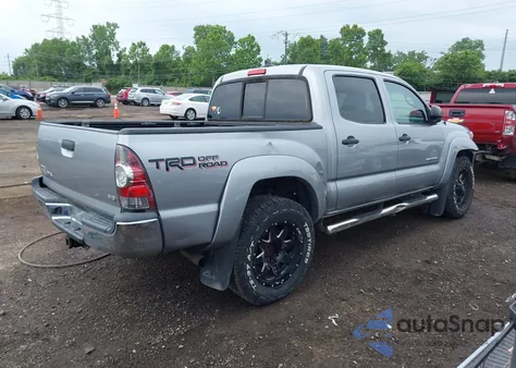 2014 Toyota Tacoma Base V6 z USA, uszkodzony, nr VIN 3TMLU4EN9EM156197